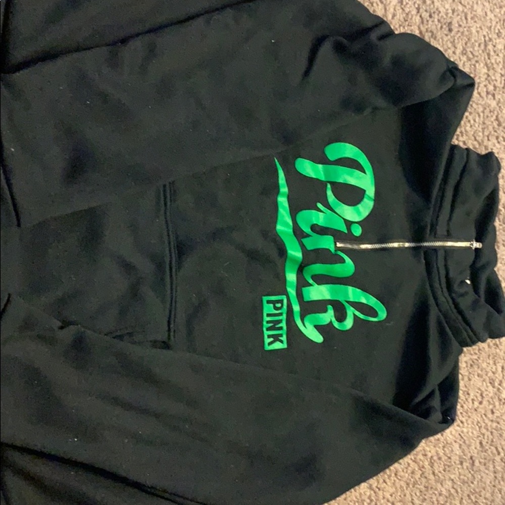 A pink brand zip up longsleeve black sweatshirt
